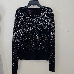 Suzanne Somers black shiny sweater